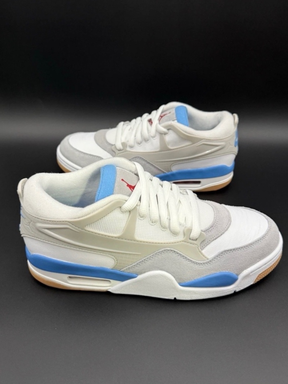 Size 7Y- Air Jordan 4 RM University Blue woman size 8.5 (25 cm)